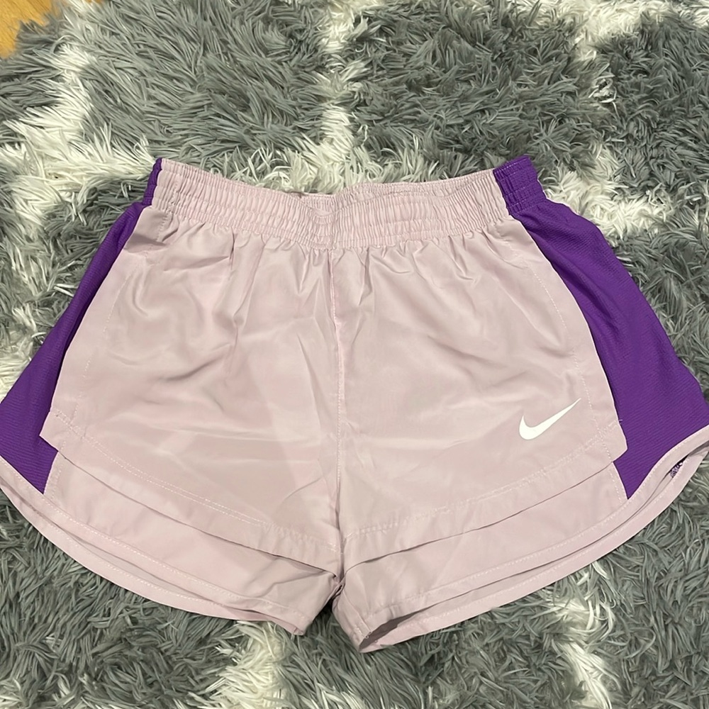 Purple Nike running shorts